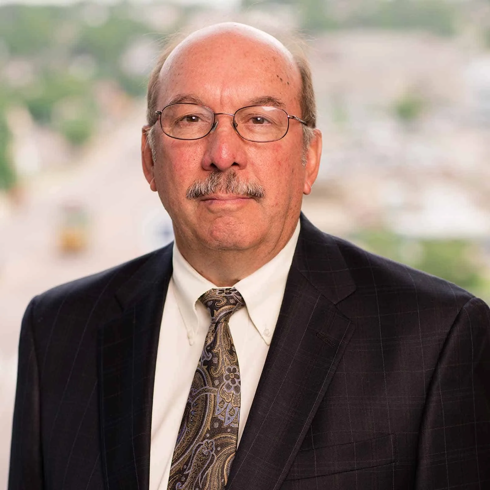 Schumacher, Miles F.