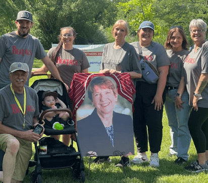 Lynn Jackson Gives Back: Walking in Remembrance and Golfing for Education